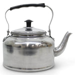 Stainless steel kettle with a black handle on a white background