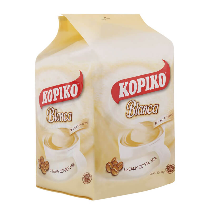 A pouch of Kopiko Blanca creamy coffee mix, 30g package.
